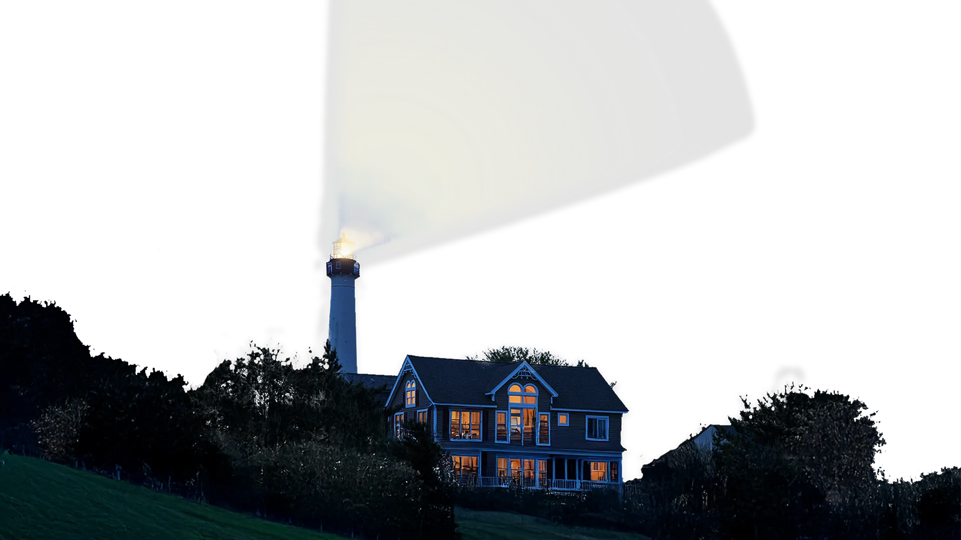 Lighthouse surrounded by bushes